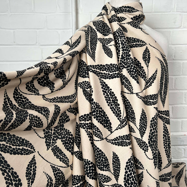 Beige Black Leaf Print Dress Fabric | Viscose Marocain Spot The Sand Mannequin