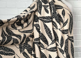 Beige Black Leaf Print Dress Fabric | Viscose Marocain Spot The Sand Mannequin