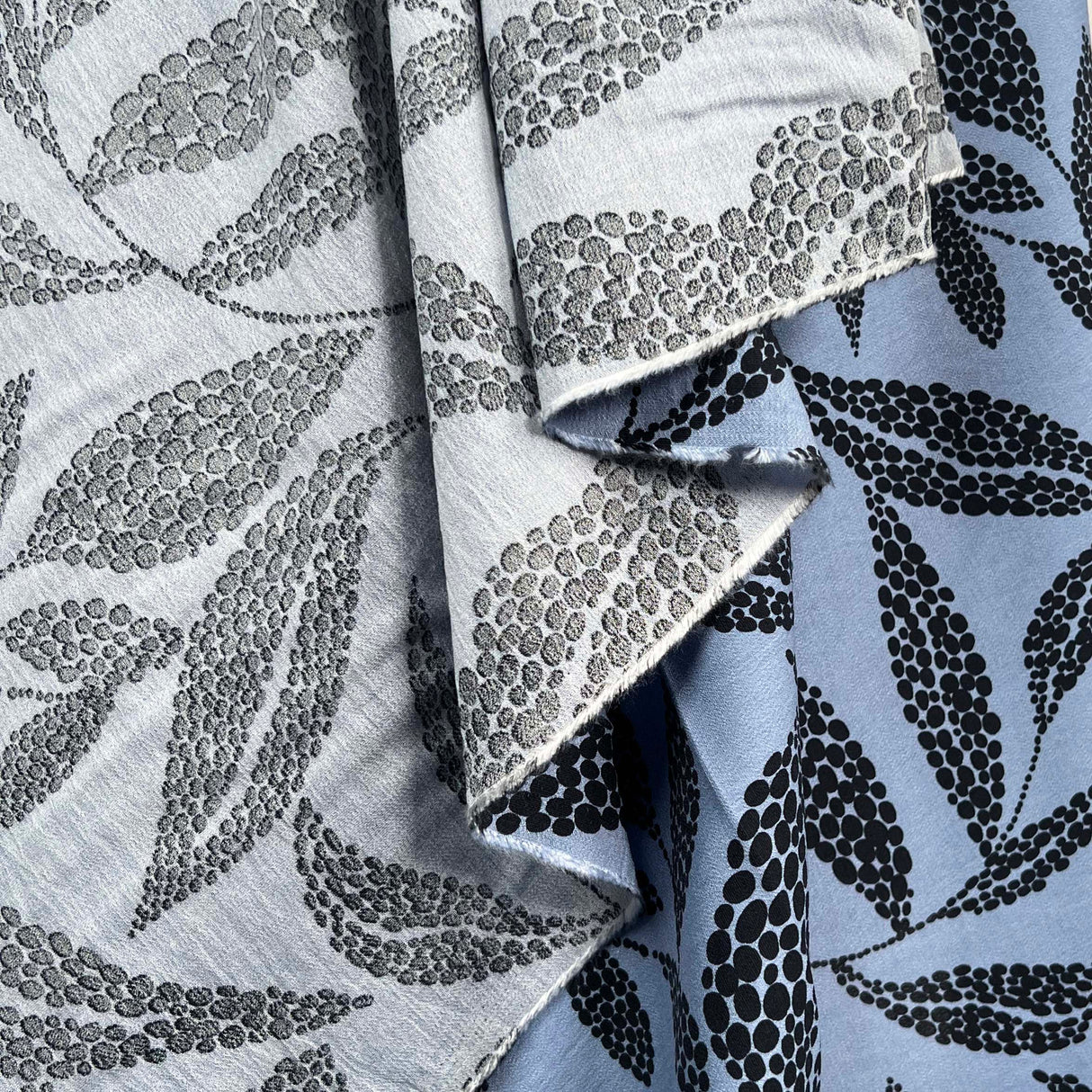 Viscose Morrocain Spot The Sky Blue Leaf Dress Fabric hang