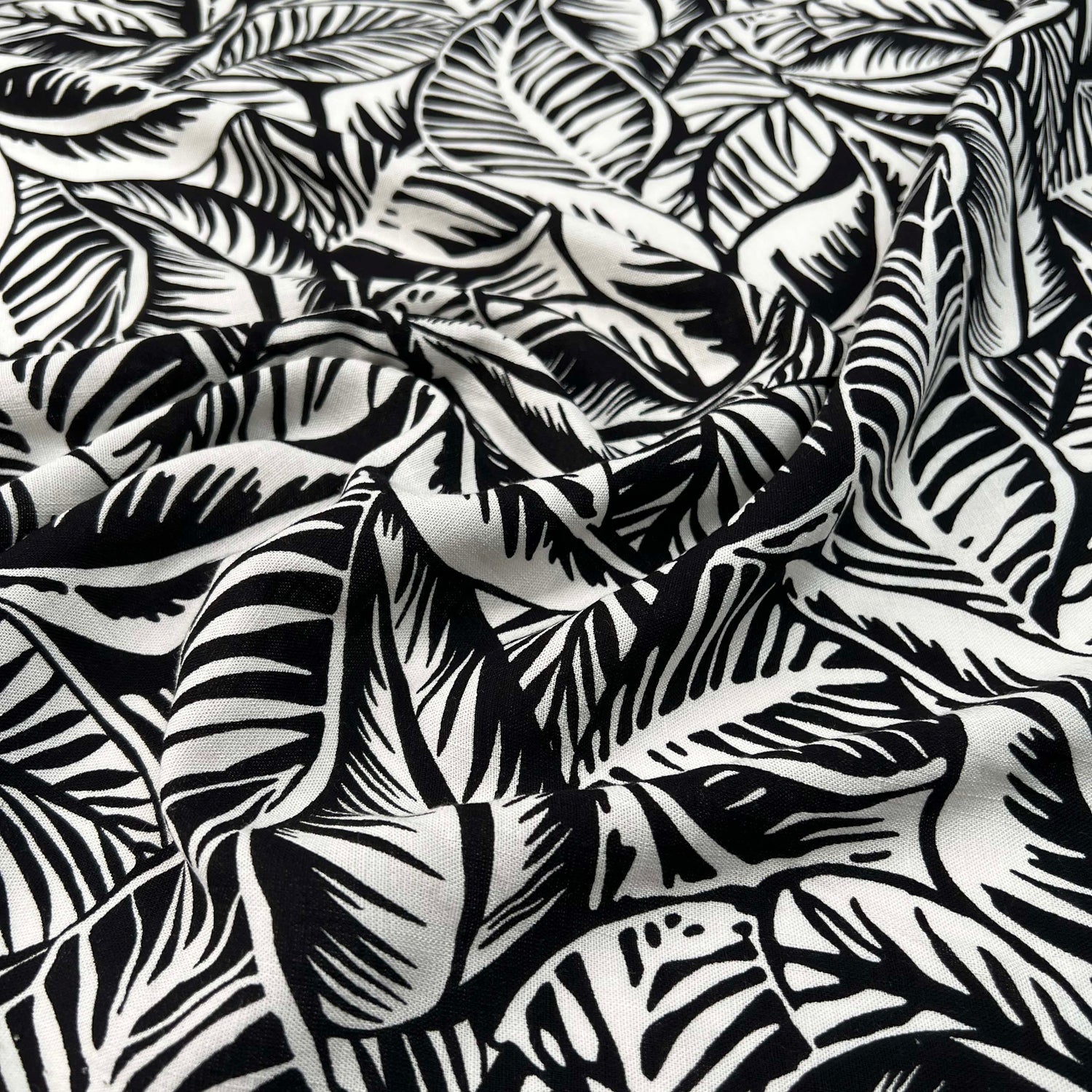 Viscose_Slub_Monochrome_Jungle_Leaf_Rayon_Spandex_Black_White_150gsm_Dress_Fabric_CU