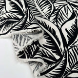 Viscose_Slub_Monochrome_Jungle_Leaf_Rayon_Spandex_Black_White_150gsm_Dress_Fabric_Fold