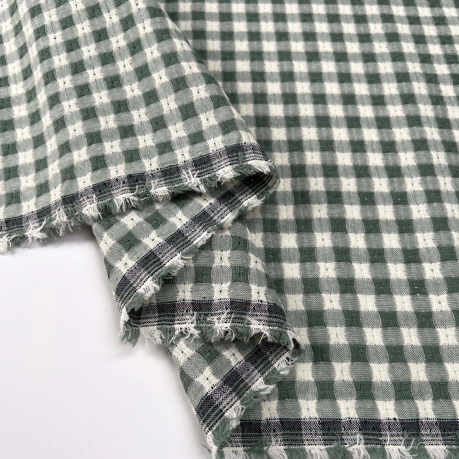 Washed_Cotton_Gingham_Jacquard_Dusty_Mint_Green_Check_White_Woven_Shirting_Fabric_Fold