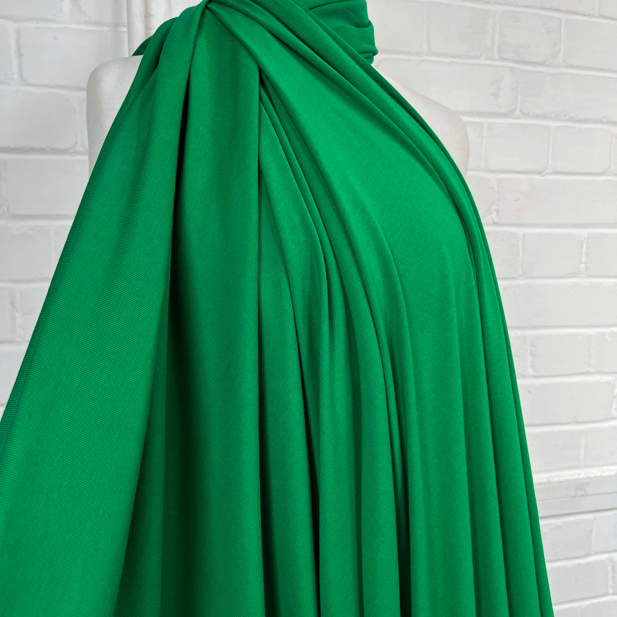 Wicked Viscose Elastane Green Plain Jersey Fabric Mannequin