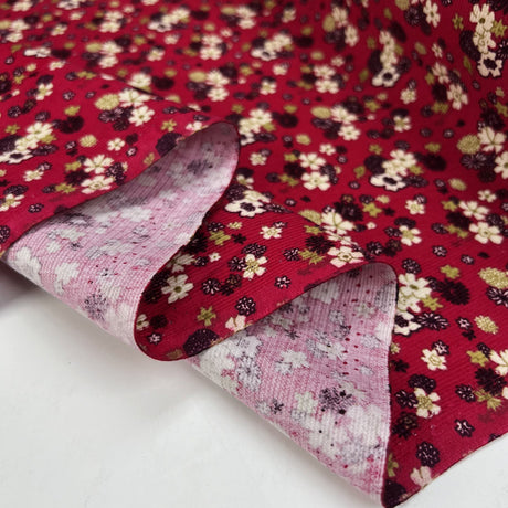 Baby Driver Flower Power Plum Cotton Needlecord Red Green Floral Corduroy Dress Fabric Fold