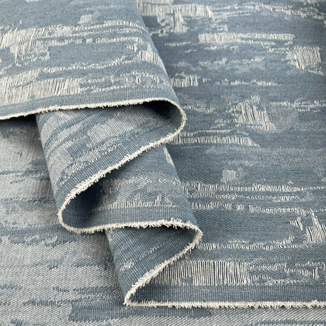 Denim Deconstruct Pale Blue Cotton Polyester Distressed 10 5oz Jacketing Fabric Fold