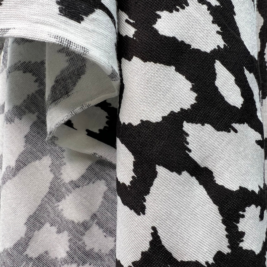 Finest Splodge Black And White Viscose Lycra Knitted Jersey Dress Fabric Fold