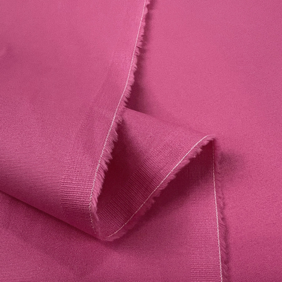 Fuchsia Flex Pink Cotton Elastane Woven Suiting Fabric Fold