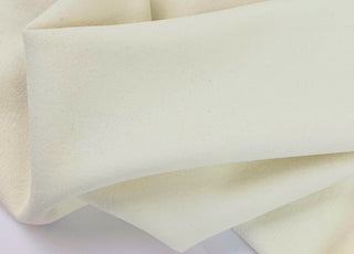 Jk Scuba Crepe Ivory Polyester Scuba Knitted Stretch Crepe Fabric Close Up Drape Fabric Photo
