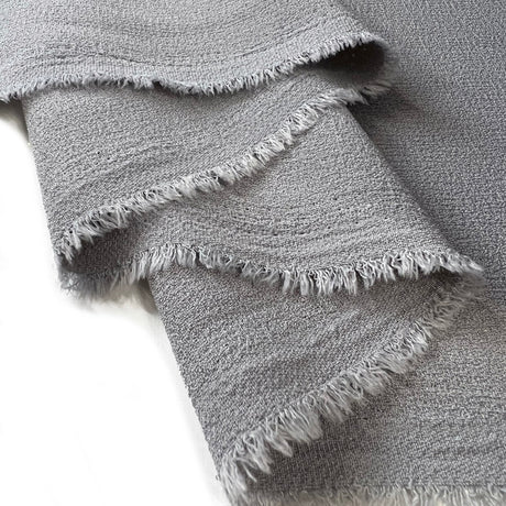 Lorien Crepe Grey Polyester Dressmaking Fabric Fold