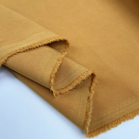 Mustardly Crepe Suiting Polyester Elastane Stretch Yellow Plain Fabric Fold