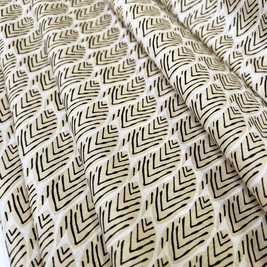 Pima Cotton Lawn Tribal Grove Sand Leaf Print Black Woven Dress Fabric