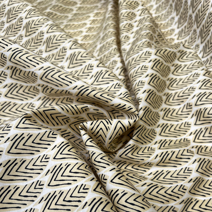 Pima Cotton Lawn Tribal Grove Sand Leaf Print Black Woven Dress Fabric