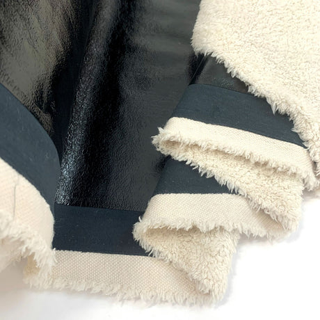 Pleather Teddy Fur Lined Faux Leather Fabric Close Up Drape Fabric Photo