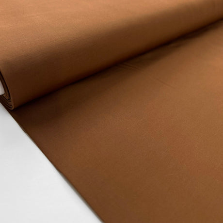 Poly cotton memory shirting fabric brown tobacco road bolt