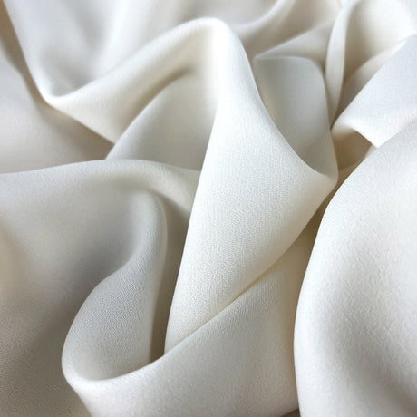 Prestige Ivory Polyester Crepe Dressmaking Fabric