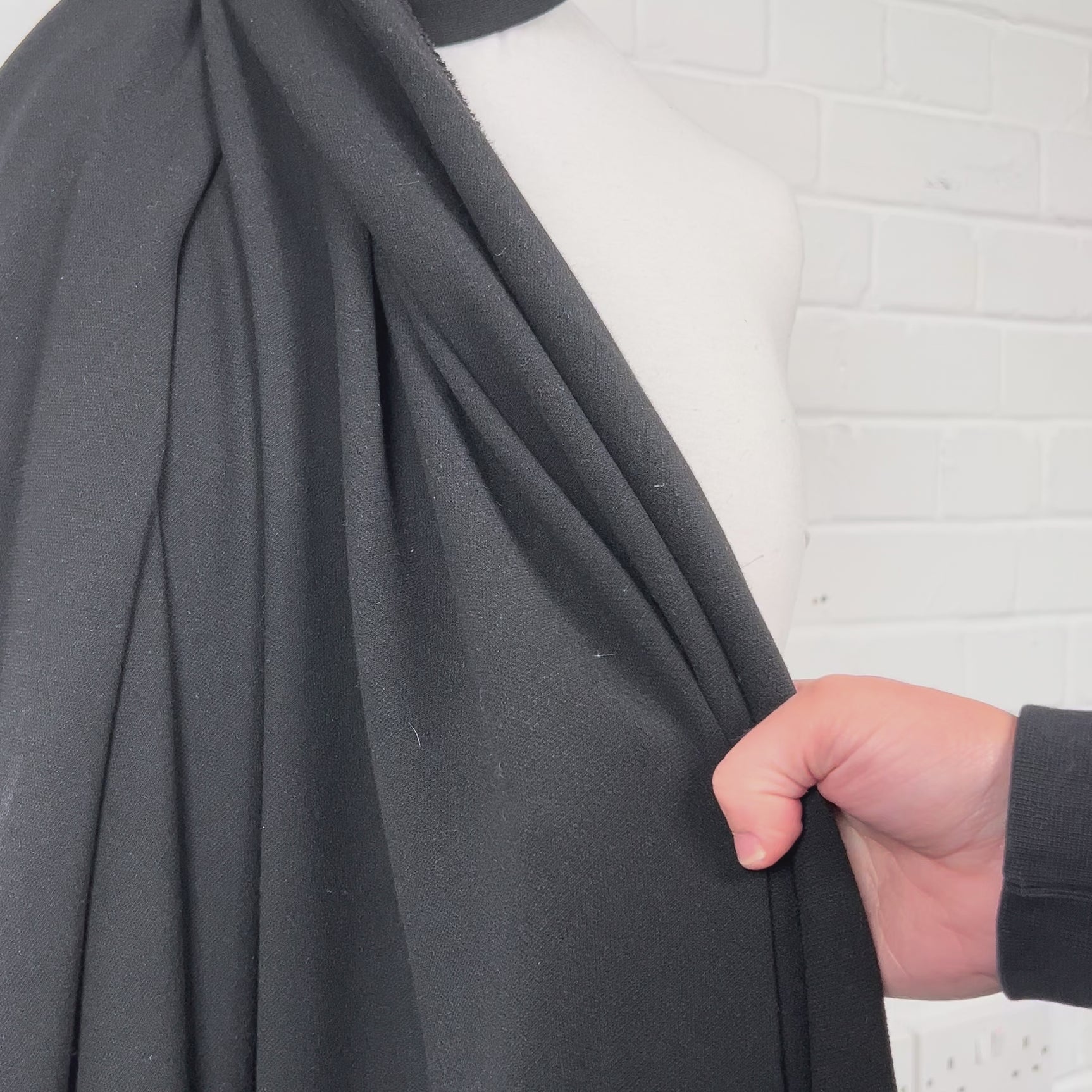 Moving Well Polyester Wool Elastane Black Midweight Portuguese Suiting Fabric Video