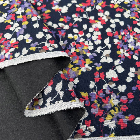 Quietly Bold Polyester Viscose Floral Navy Pink Stretch Knit Jersey Fabric Fold