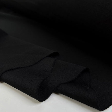 Scuba Crepe Black Polyester Elastane Plain Knitted Jersey Fabric Fold