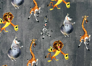 Stonewashed Madagascar Licensed Brushed Cotton Elastane Sweatshirting Fabric Grey Ruler