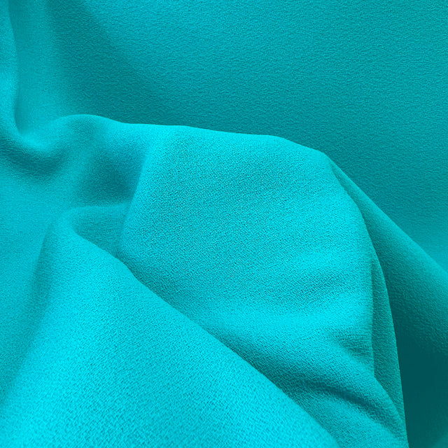 Triple Crepe Turquoise Blue Polyester Dress Fabric