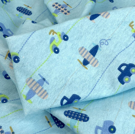 Winceyette The Big Race Cars Pale Blue Brushed Cotton Shirting Fabric Close Up Fabric Photo