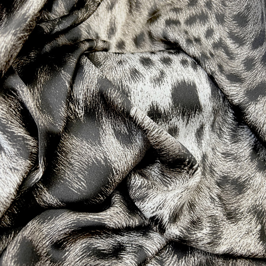 https://www.croftmill.co.uk/images/pictures/00-2023/06-june-2023/polyester_animal_print_dress_fabric_silky_satin_sepia_leopard_cu.jpg?v=31c90bfb