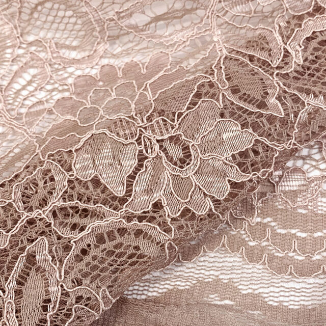 Spanish Eyes - Dusky Pink - Stretch Corded Polyester Floral Lace Dressmaking Fabric - Close Up Fabric Photo 
