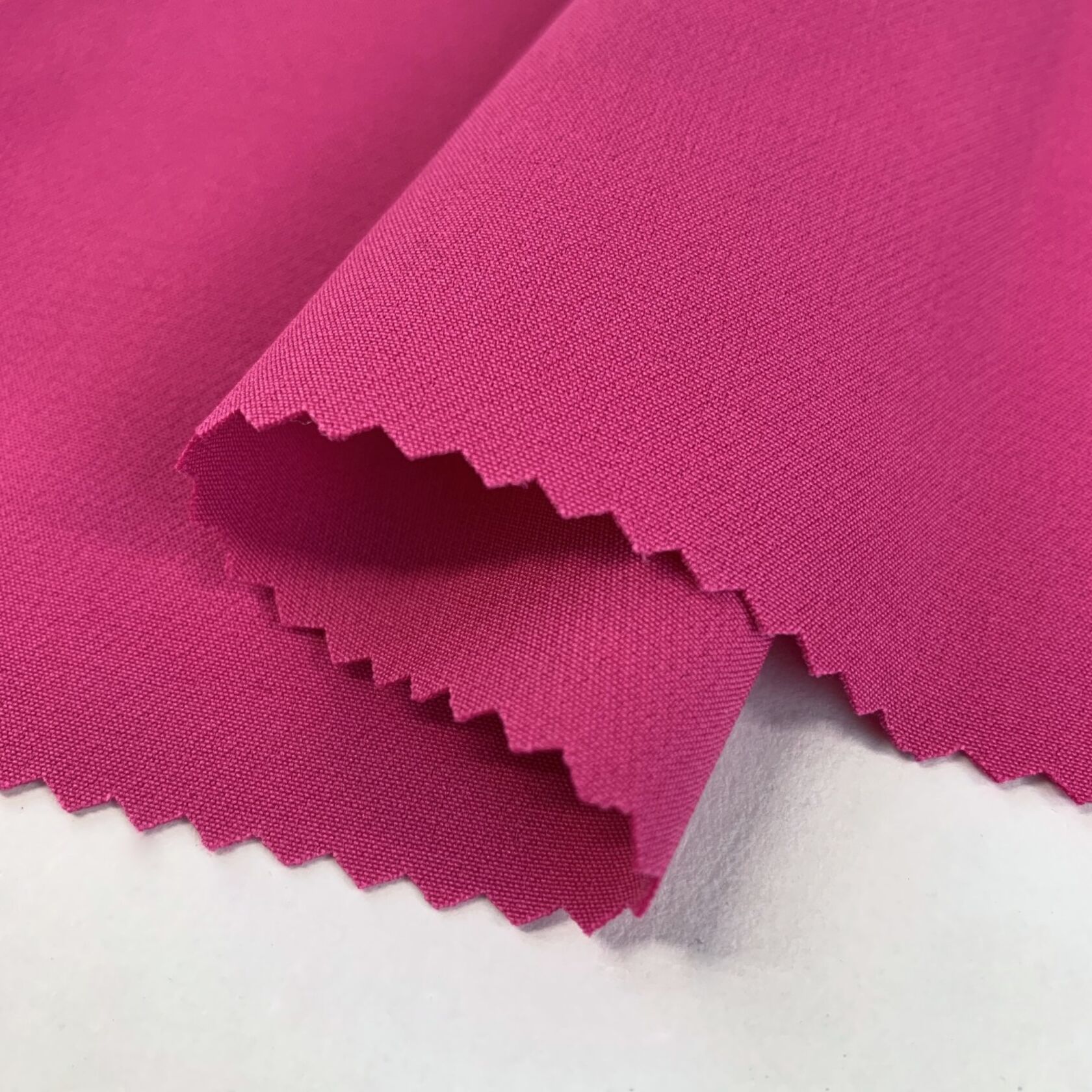 French Crepe - Rose - Pink Polyester Crepe Suiting Fabric - Fold