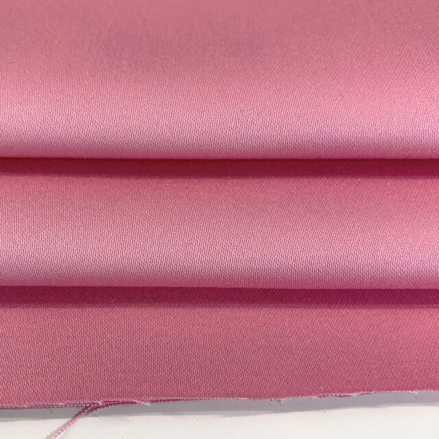 Hendon Baby Pink Stretch Trouser Fabric fold