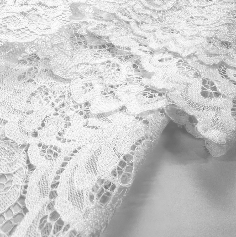 White scalloped lace fabric store