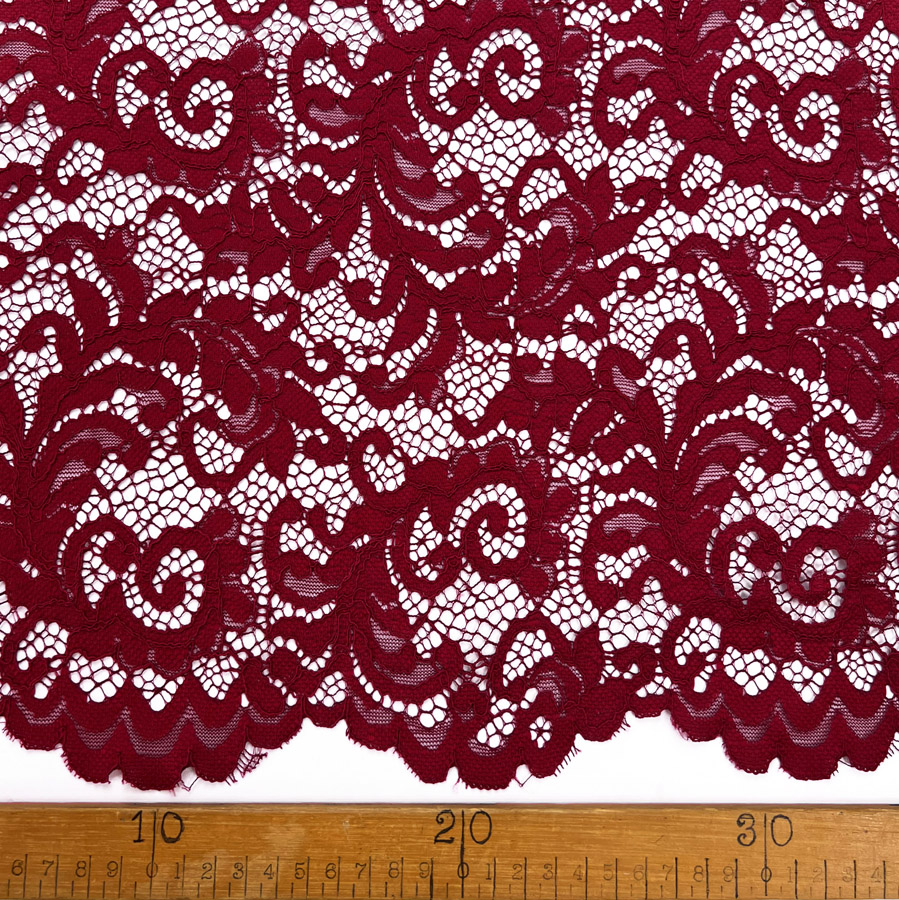 Red scallop corded lace $38.99/m 140 cm wide - Gardams Fabrics