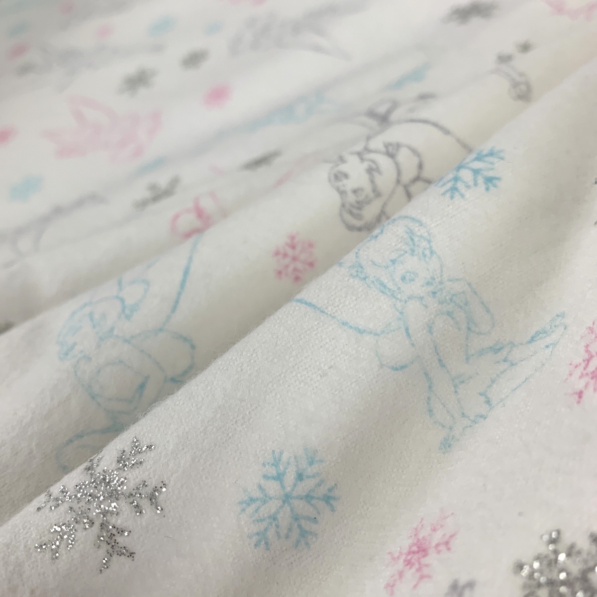 winceyette-tinkerbell-brushed-cotton-winceyette-narrow-pale-blue-pink-and-grey-fairys-on-a-white-background-fold.jpg