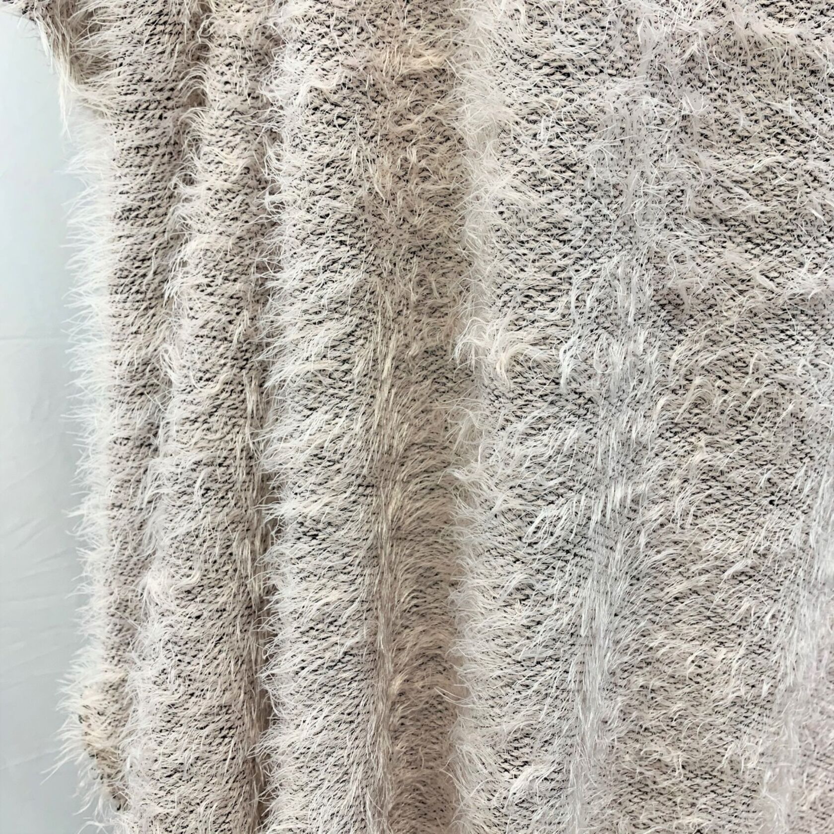 white furry jumper